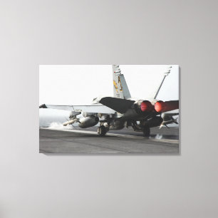 An F/A-18C Hornet launches from the flight deck 2 Canvas Print