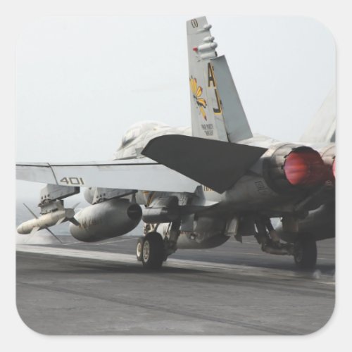 An FA_18C Hornet launches from the flight deck 2 Square Sticker