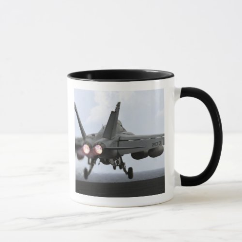 An FA_18E Super Hornet launches Mug