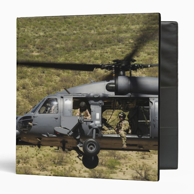 An HH-60 Pave Hawk flies over the desert Binder (Front/Inside)