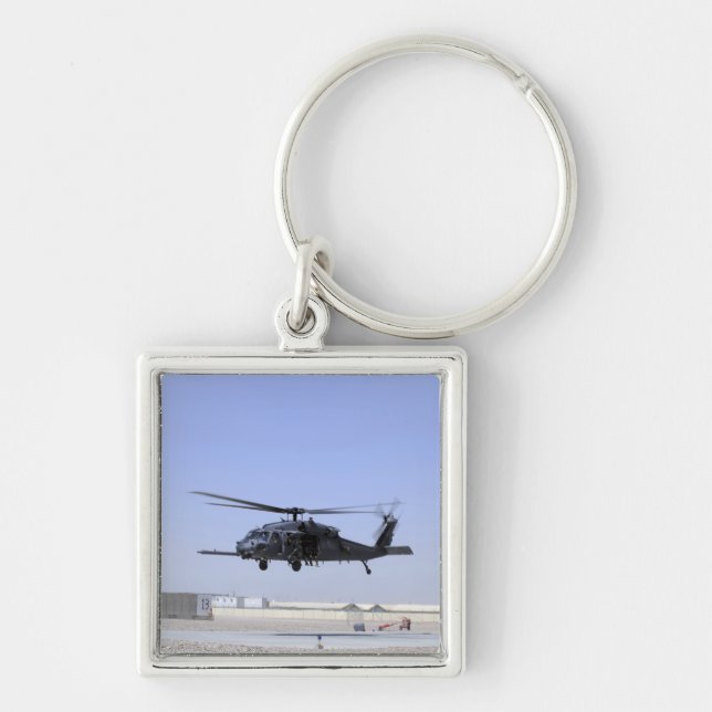 An HH-60G Pave Hawk taking off from Camp Bastio Keychain (Front)