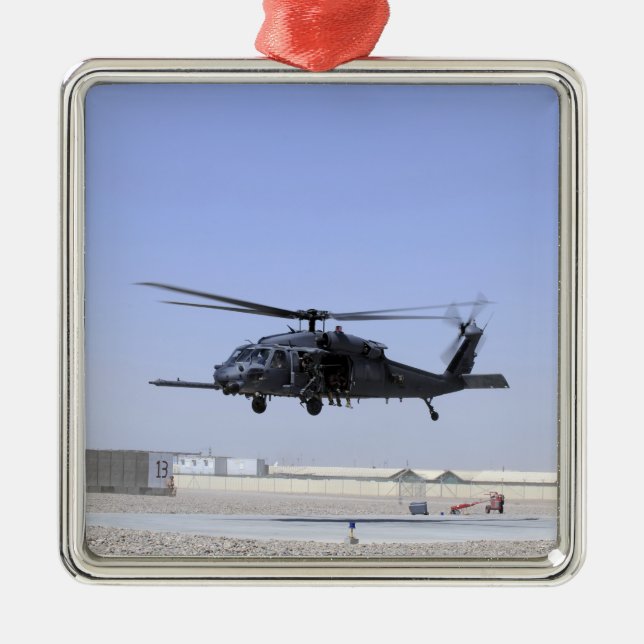 An HH-60G Pave Hawk taking off from Camp Bastio Metal Ornament (Front)