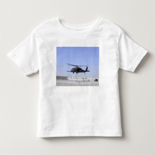 An HH_60G Pave Hawk taking off from Camp Bastio Toddler T_shirt