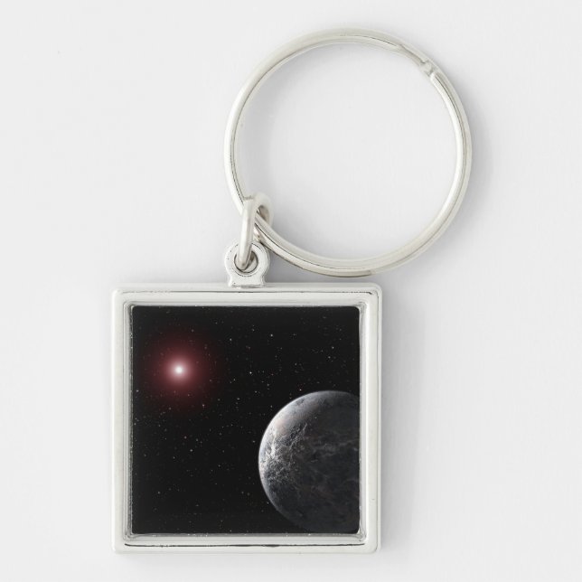 An icy/rocky planet orbiting a dim star keychain (Front)