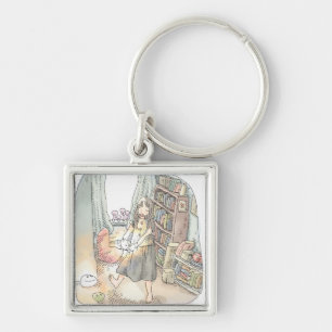 an illustration of a woman dancing with a pale lig keychain