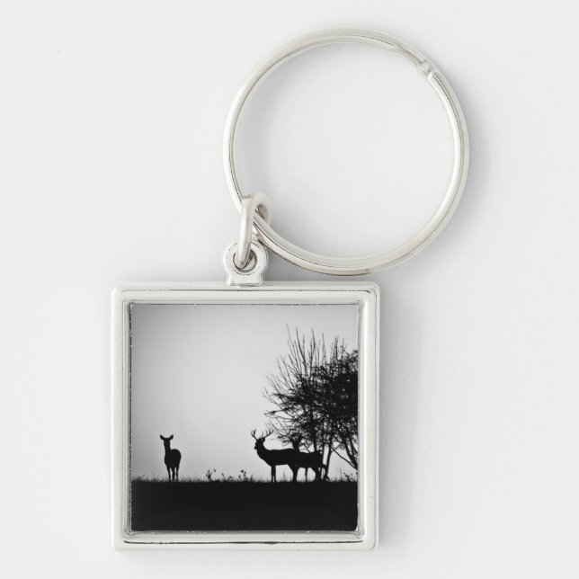 An image of some deer in the morning mist keychain (Front)