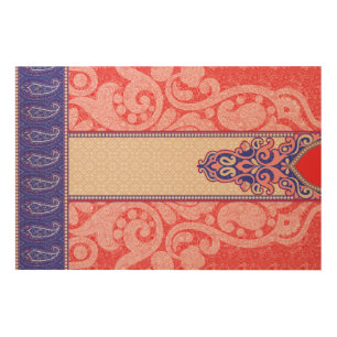 An intricate paisley pattern featuring vibrant red wood wall art