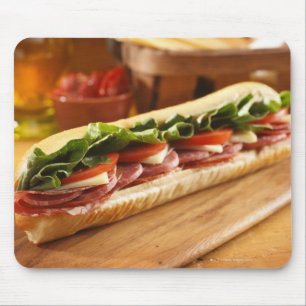 An Italian sub sandwich with 2 Mouse Pad