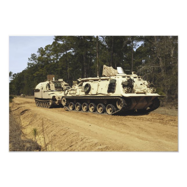 An M-88 recovery vehicle begins to tow an M992 Photo Print (Front)