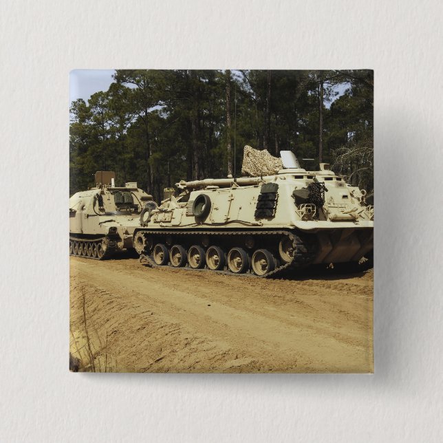 An M-88 recovery vehicle begins to tow an M992 Pinback Button (Front)