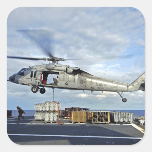 An MH_60S Seahawk prepares to deliver ammunitio Square Sticker