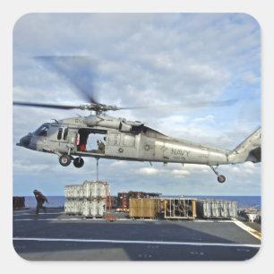 An MH-60S Seahawk prepares to deliver ammunitio Square Sticker