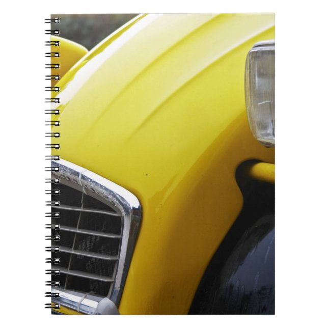 An old black and yellow Citroen 2CV 2 CV, detail Notebook (Front)
