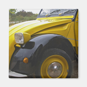 An old black and yellow Citroen 2CV 2 CV, Magnet
