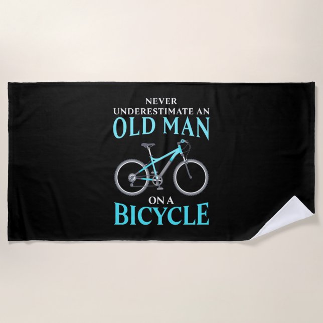 An Old Man On A Bicycle Beach Towel (Front)
