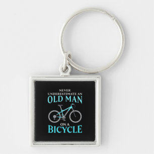 An Old Man On A Bicycle Keychain