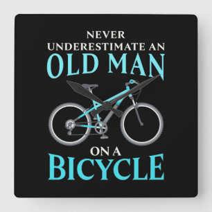 An Old Man On A Bicycle Square Wall Clock