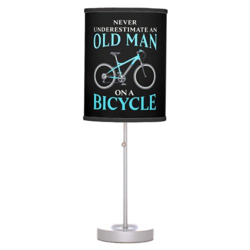 An Old Man On A Bicycle Table Lamp