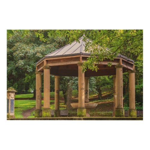 An old pavilion in a park wood wall art