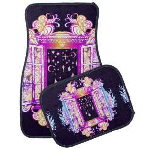 An open vintage window with pendants against a bac car floor mat