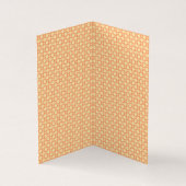 an orange and white background with a pattern (Inside)