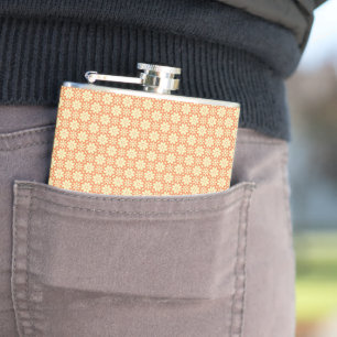 an orange and white background with a pattern flask