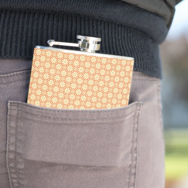 an orange and white background with a pattern flask (In Situ)