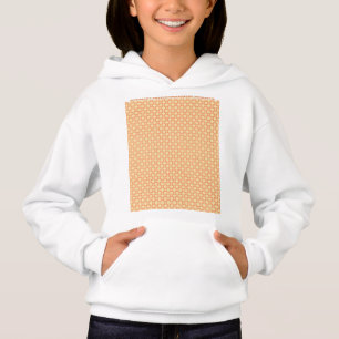 an orange and white background with a pattern hoodie