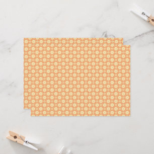 an orange and white background with a pattern invitation
