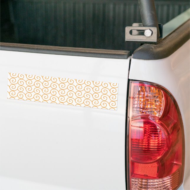an orange and white background with swirls bumper sticker (On Truck)
