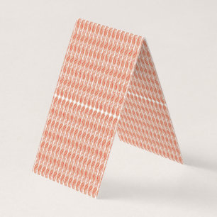an orange and white pattern on a white background business card