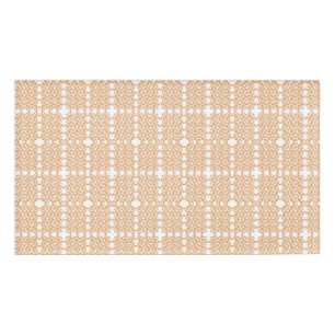 an orange and white wallpaper with a floral design name tag