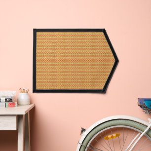 an orange and yellow background with small dots pennant