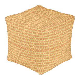 an orange and yellow background with small dots pouf