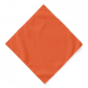 an orange background with a black border bandana