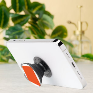 an orange background with a black border PopSocket