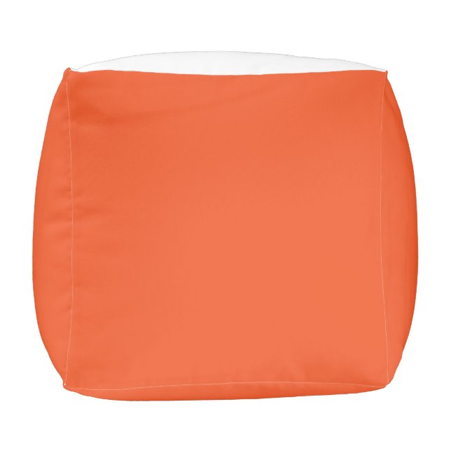 an orange background with a black border pouf (Bottom)
