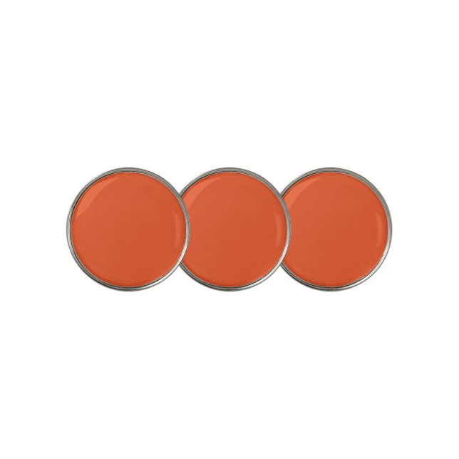an orange background with a golf ball marker (3 Up)
