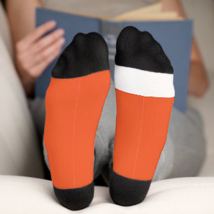 an orange background with a socks