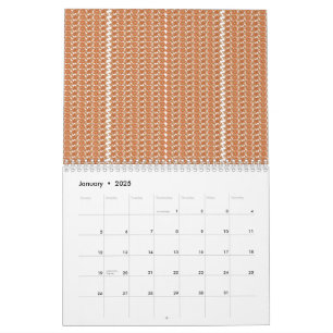 An orange rug with a textured pattern lies flat on calendar