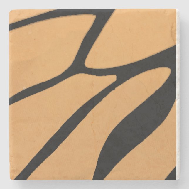  an orange surface with irregular black lines stone coaster (Front)
