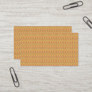 An orange, yellow, and brown symmetrical pattern w business card