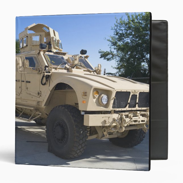 An Oshkosh M-ATV 3 Ring Binder (Front/Inside)