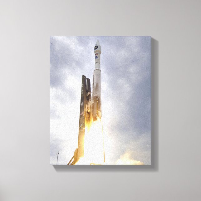 An United Launch Alliance Atlas V rocket lifts Canvas Print (Front)