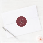 Anastasia Burgundy Elegant Wedding Classic Round Sticker<br><div class="desc">Classic wedding stickers featuring a simple design with your two initial monogram in an elegant handwriting script for a modern touch.  The color palette may be changed in the design editing tool.</div>