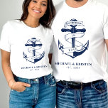 Anchored in Love White Nautical Anchor Wedding  T-Shirt<br><div class="desc">Nautical blue and white wedding honeymoon couples shirt.  Great for a Navy (military) or lake house wedding.  Design features an anchor wrapped in a banner with text "Anchored in love".  Personalize it with your wedding details.</div>