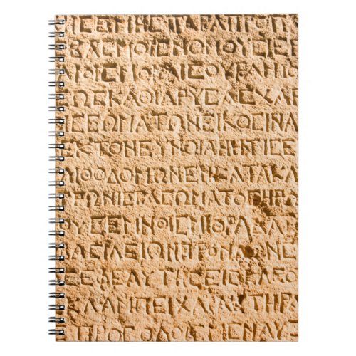 ancient Greek writing chiseled on stone Notebook