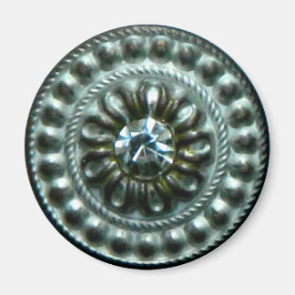 Ancient silver brooch with gem magnet