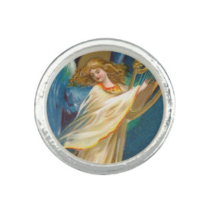 Angel Playing Music On A Harp Ring