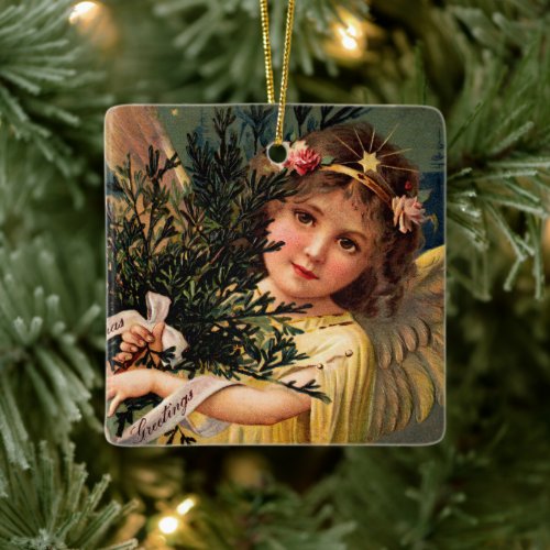 Angel with an Armful of Christmas Greenery Ceramic Ornament